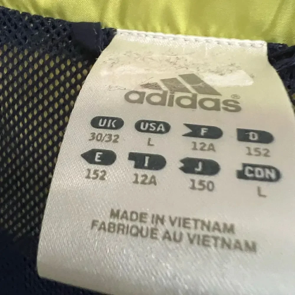 Vintage Adidas youth large navy and light green zip up jacket